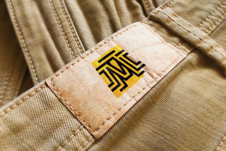Paper-Label-Logo-Mockup-on-Yellow-Jeans-Symbol-Feat-IMG