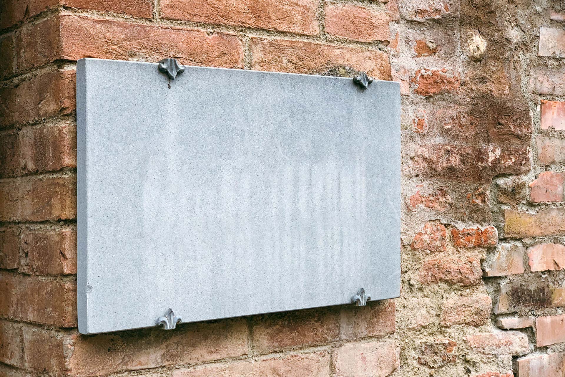 Stone-Sign-on-Brick-Wall-Logo-Mockup-Blank